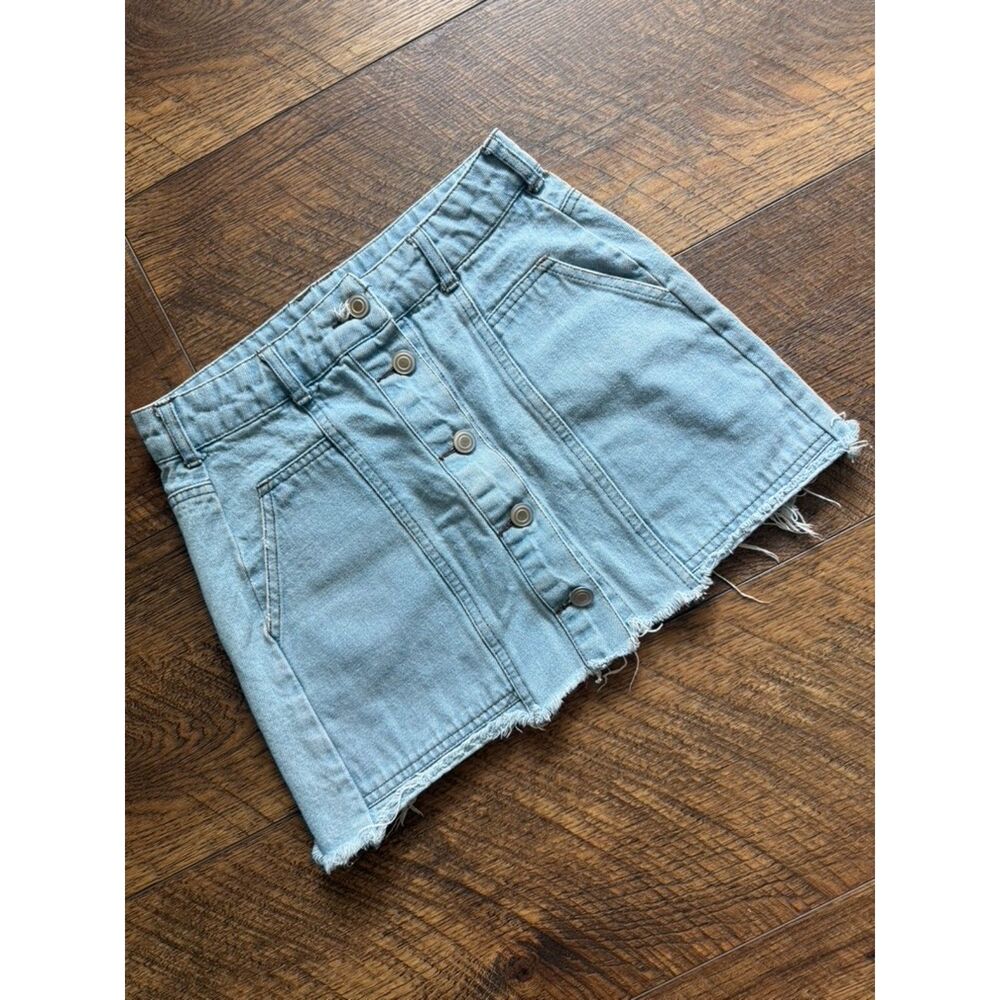 Stevie Henderson light wash denim button-front mini skirt raw hem